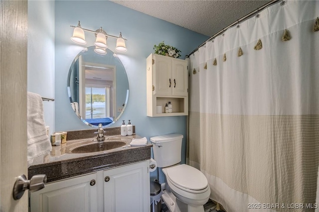6570 Pelican Dr Unit 404, Osage Beach, MO 65065 - bathroom with toilet, a textured ceiling, vanity, and a shower with shower curtain