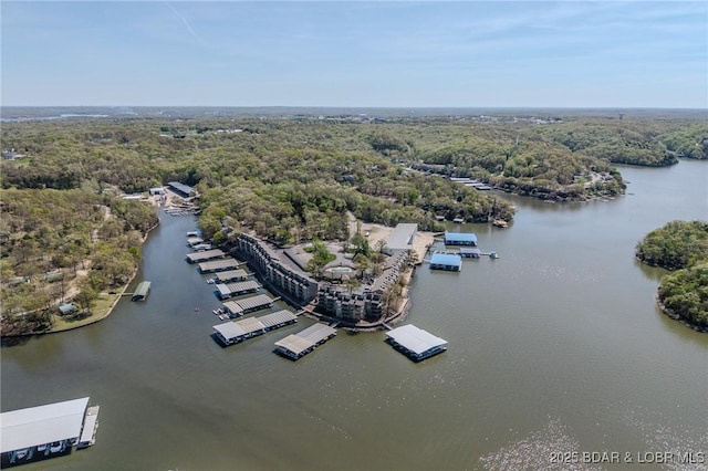 6570 Pelican Dr Unit 404, Osage Beach, MO 65065 - drone / aerial view of a nearby body of water and a heavily wooded area