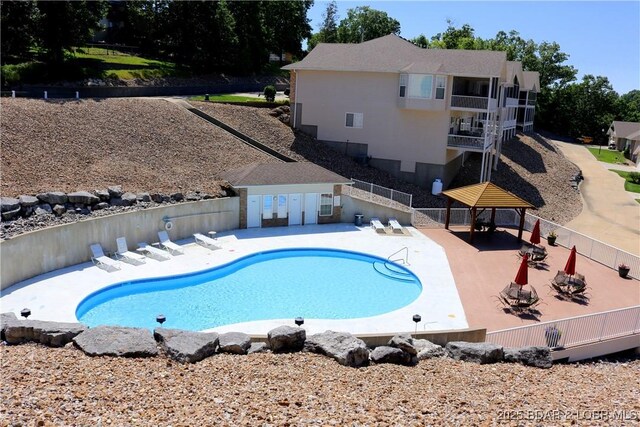 5177 Vicus Castry, Osage Beach, MO 65065 - view of pool with a gazebo, a patio, a fenced in pool, and fence