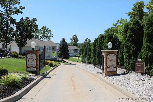 5177 Vicus Castry, Osage Beach, MO 65065 - view of road with street lighting, curbs, and a residential view