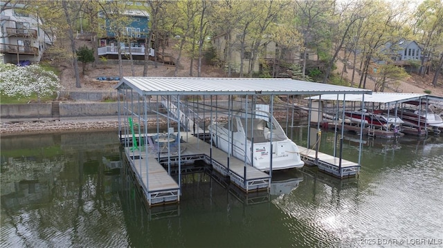 dock area featuring a water view and boat lift