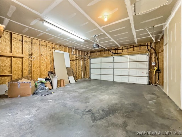 garage featuring a garage door opener