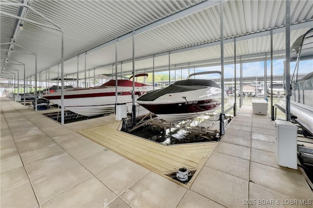view of dock with boat lift