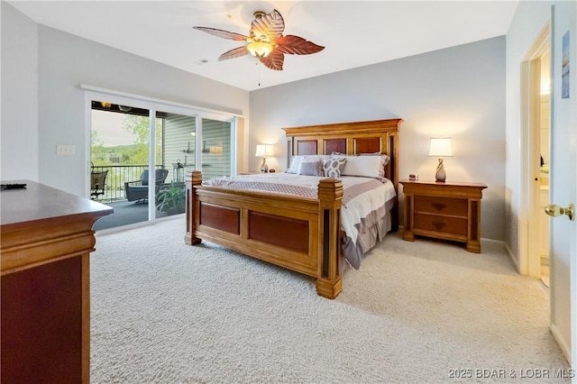 bedroom with access to exterior, a ceiling fan, and light colored carpet