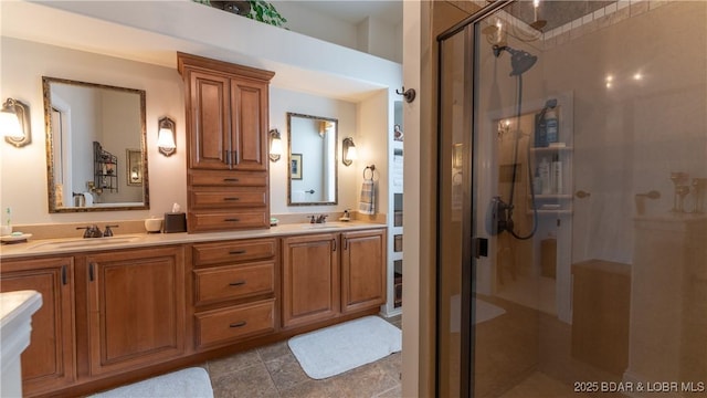 full bathroom with double vanity, a sink, and a stall shower