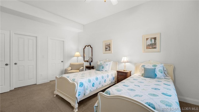 bedroom featuring baseboards, a ceiling fan, and carpet