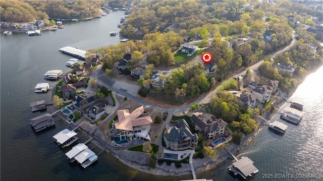 birds eye view of property featuring a water view