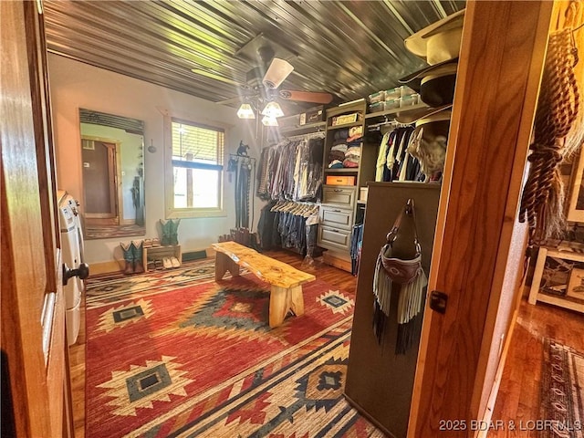 69985 US Highway 50, Tipton, MO 65081 - spacious closet with a ceiling fan and wood finished floors