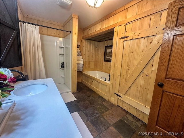 69985 US Highway 50, Tipton, MO 65081 - full bath with wooden walls, a stall shower, stone finish flooring, a bath, and vanity