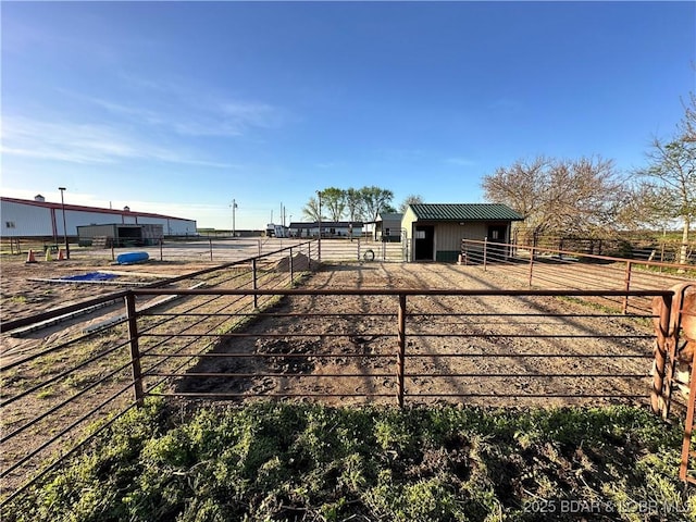69985 US Highway 50, Tipton, MO 65081 - view of yard featuring an exterior structure, an outdoor structure, and an outbuilding