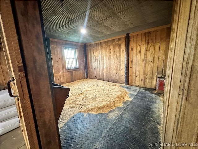 69985 US Highway 50, Tipton, MO 65081 - unfurnished room featuring wood walls