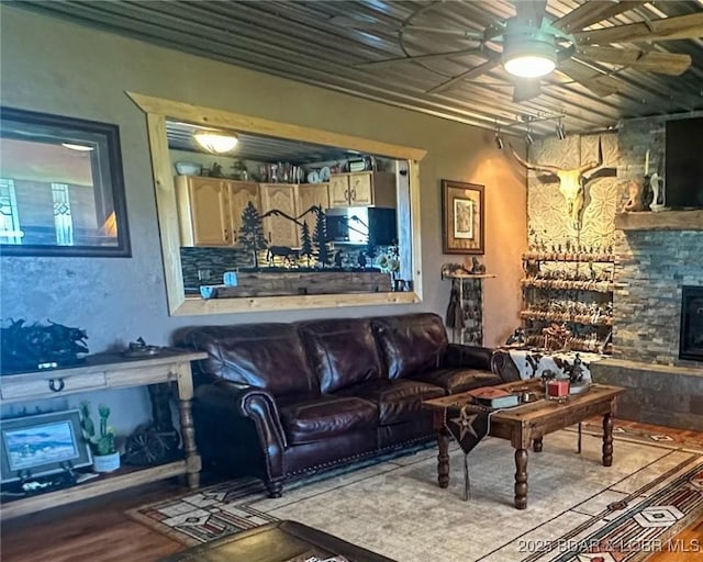 69985 US Highway 50, Tipton, MO 65081 - living area featuring ceiling fan and wood finished floors