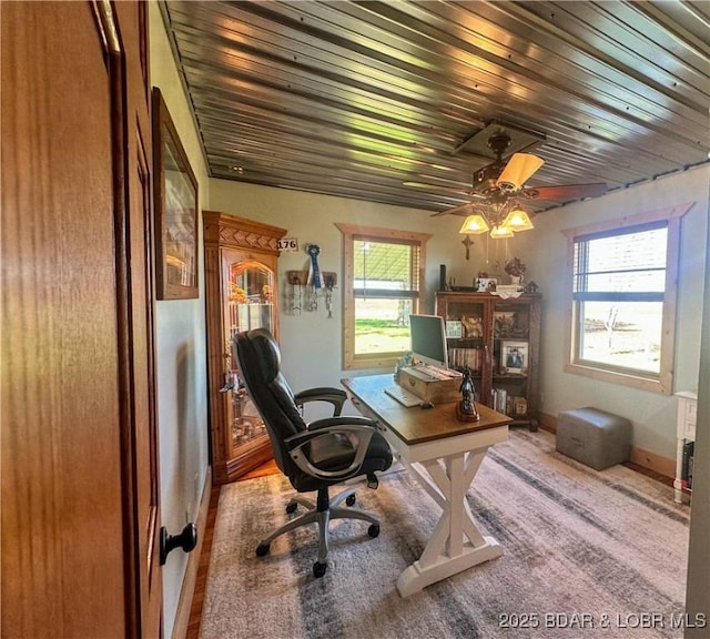 69985 US Highway 50, Tipton, MO 65081 - home office featuring plenty of natural light, a ceiling fan, and baseboards