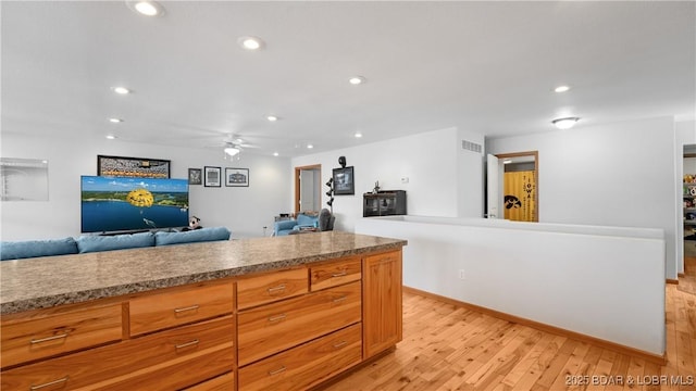 reception with ceiling fan and visible vents