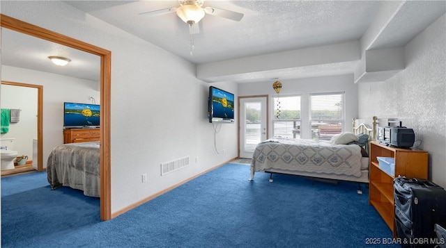 carpeted bedroom with access to exterior, visible vents, a textured wall, and a ceiling fan