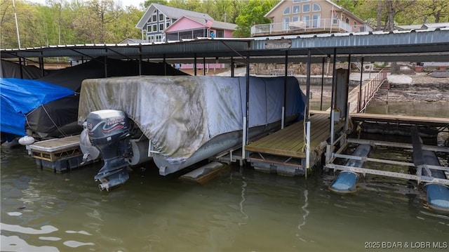 view of dock with a water view