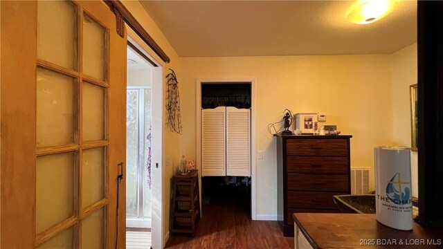 30993 Viewside Dr, Rocky Mount, MO 65072 - hall with dark wood finished floors, baseboards, and visible vents