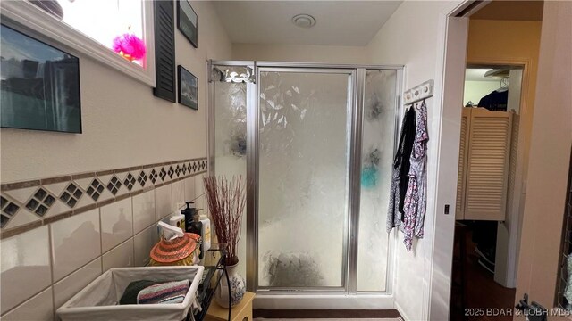30993 Viewside Dr, Rocky Mount, MO 65072 - bathroom with a stall shower and tile walls