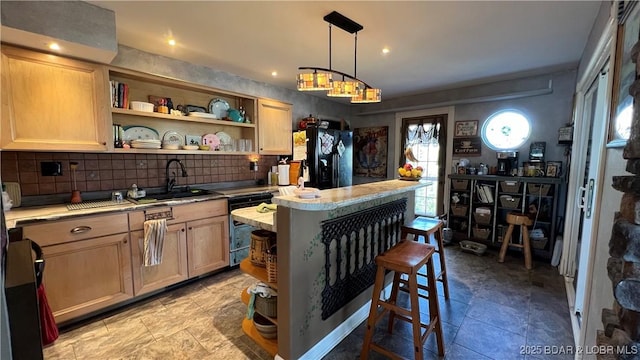 30993 Viewside Dr, Rocky Mount, MO 65072 - kitchen featuring a sink, decorative backsplash, black refrigerator with ice dispenser, open shelves, and dishwasher