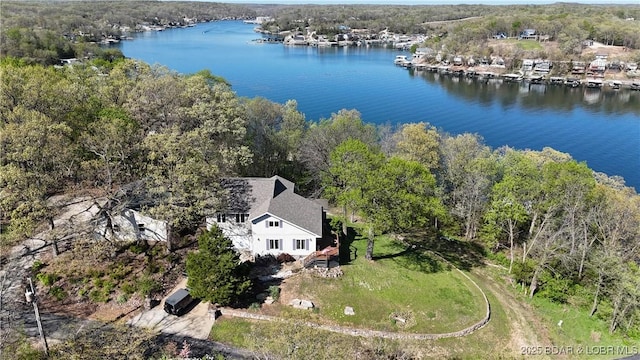 30993 Viewside Dr, Rocky Mount, MO 65072 - birds eye view of property with a wooded view and a water view