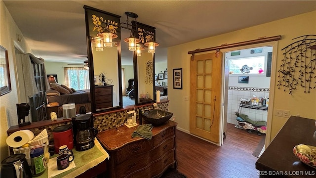 30993 Viewside Dr, Rocky Mount, MO 65072 - dining area with ceiling fan and dark wood-type flooring