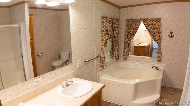 full bath with vanity, ornamental molding, wallpapered walls, a bath, and a stall shower