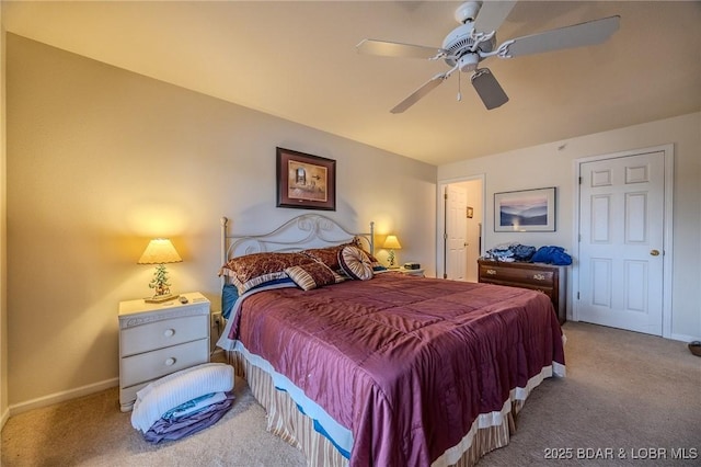 bedroom with baseboards, carpet, and a ceiling fan