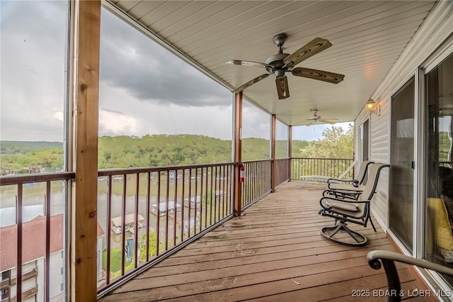 wooden terrace with ceiling fan