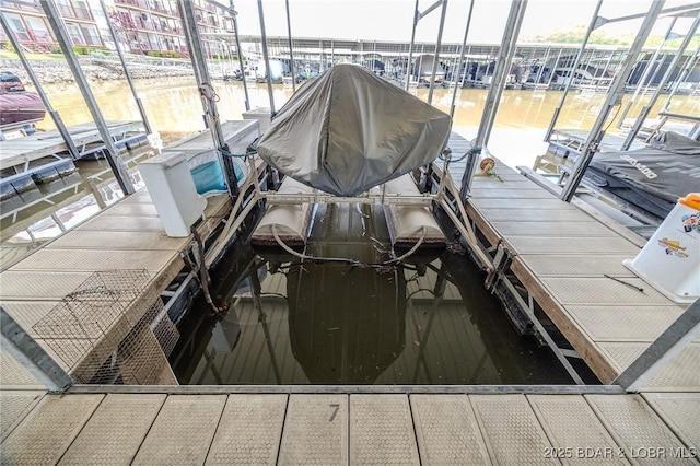 view of storm shelter with a water view