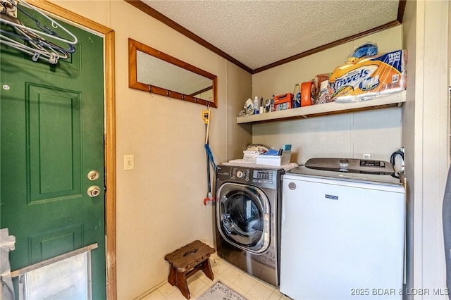 122 Simpson Rd, Urbana, MO 65767 - clothes washing area with laundry area, ornamental molding, a textured ceiling, and washer and dryer