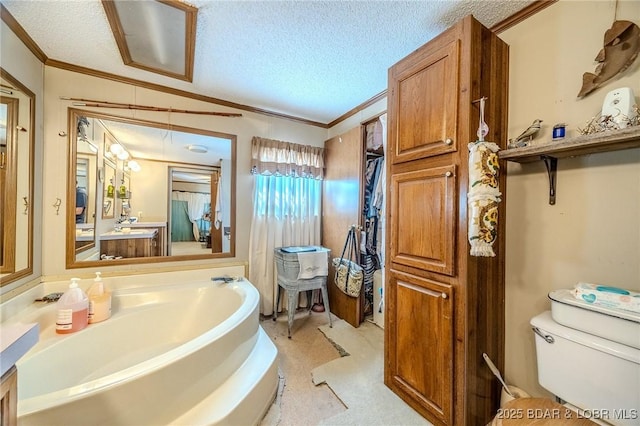 122 Simpson Rd, Urbana, MO 65767 - full bath featuring a garden tub, a textured ceiling, vanity, toilet, and ornamental molding