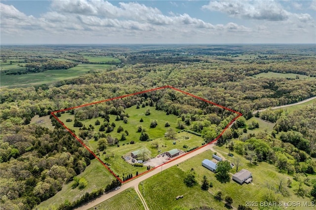 122 Simpson Rd, Urbana, MO 65767 - birds eye view of property with a wooded view