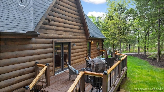 wooden deck featuring outdoor dining space