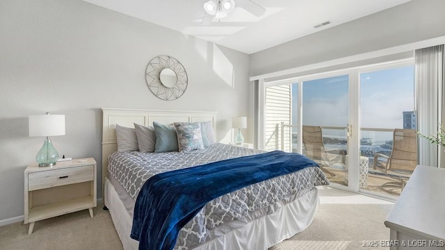 183 Upper Monarch Cove Ct Unit 4E, Lake Ozark, MO 65049 - carpeted bedroom with visible vents, baseboards, ceiling fan, and access to exterior