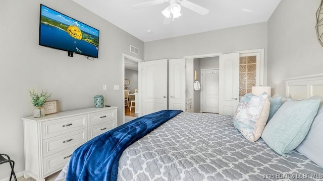 183 Upper Monarch Cove Ct Unit 4E, Lake Ozark, MO 65049 - bedroom featuring a ceiling fan and visible vents
