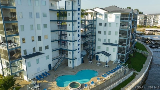 183 Upper Monarch Cove Ct Unit 4E, Lake Ozark, MO 65049 - view of property with a community pool