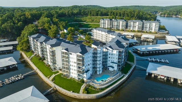 183 Upper Monarch Cove Ct Unit 4E, Lake Ozark, MO 65049 - birds eye view of property with a water view and a forest view