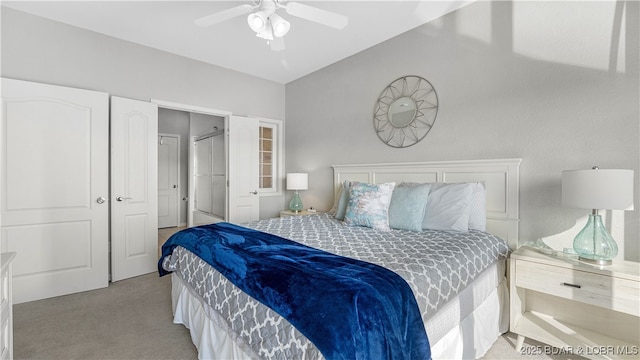 183 Upper Monarch Cove Ct Unit 4E, Lake Ozark, MO 65049 - bedroom with a ceiling fan, vaulted ceiling, and light carpet