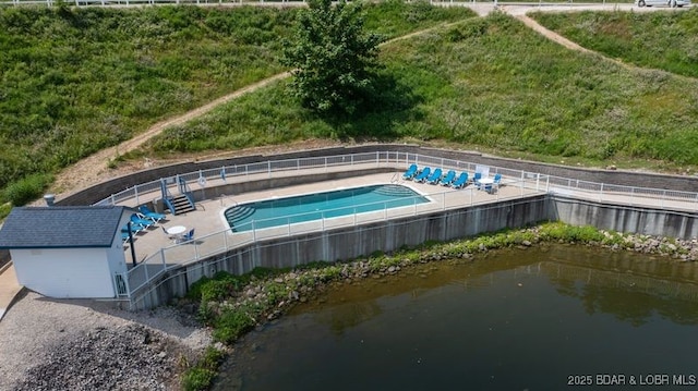 183 Upper Monarch Cove Ct Unit 4E, Lake Ozark, MO 65049 - view of pool with fence, a fenced in pool, and stairs