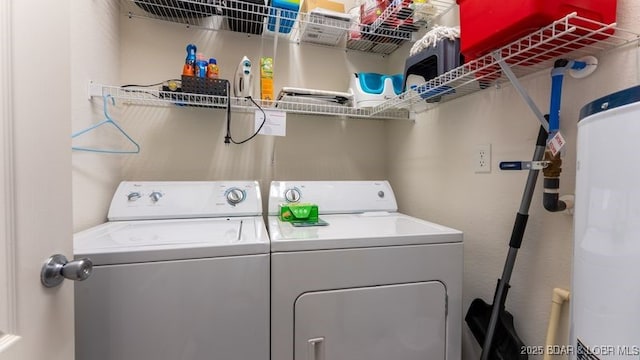 183 Upper Monarch Cove Ct Unit 4E, Lake Ozark, MO 65049 - washroom featuring water heater, laundry area, and independent washer and dryer