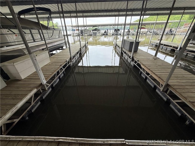611 Lazy Days Rd Unit R-5, Osage Beach, MO 65065 - dock area with boat lift, a water view, and central AC