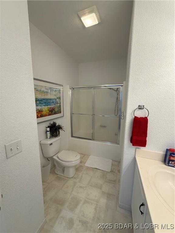 611 Lazy Days Rd Unit R-5, Osage Beach, MO 65065 - full bathroom with vanity, combined bath / shower with glass door, and toilet