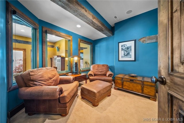 32 Wild Pines Ct, Sunrise Beach, MO 65079 - living area with carpet flooring and beamed ceiling