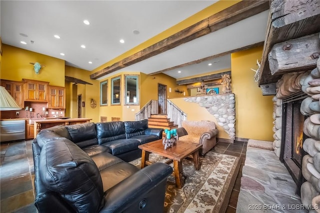 32 Wild Pines Ct, Sunrise Beach, MO 65079 - living room with recessed lighting, stairs, a fireplace, and beam ceiling