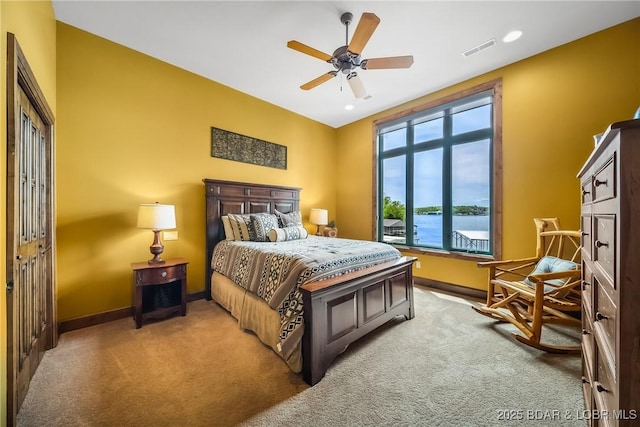 32 Wild Pines Ct, Sunrise Beach, MO 65079 - carpeted bedroom featuring baseboards and ceiling fan