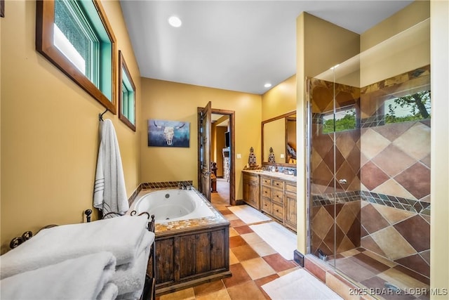32 Wild Pines Ct, Sunrise Beach, MO 65079 - full bath featuring a stall shower, vanity, a whirlpool tub, and recessed lighting