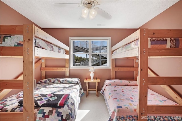 bedroom with carpet flooring and a ceiling fan