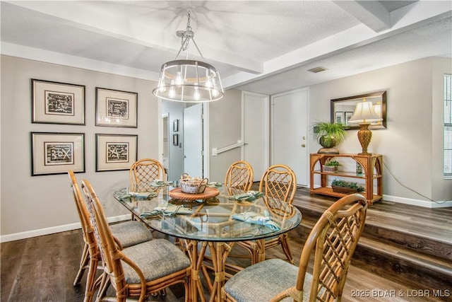 dining space featuring beamed ceiling, visible vents, baseboards, and dark wood-type flooring