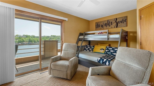 32 Cedar Ct Unit 3A, Lake Ozark, MO 65049 - bedroom with visible vents and access to exterior