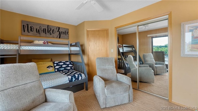 32 Cedar Ct Unit 3A, Lake Ozark, MO 65049 - carpeted bedroom featuring a closet and a ceiling fan